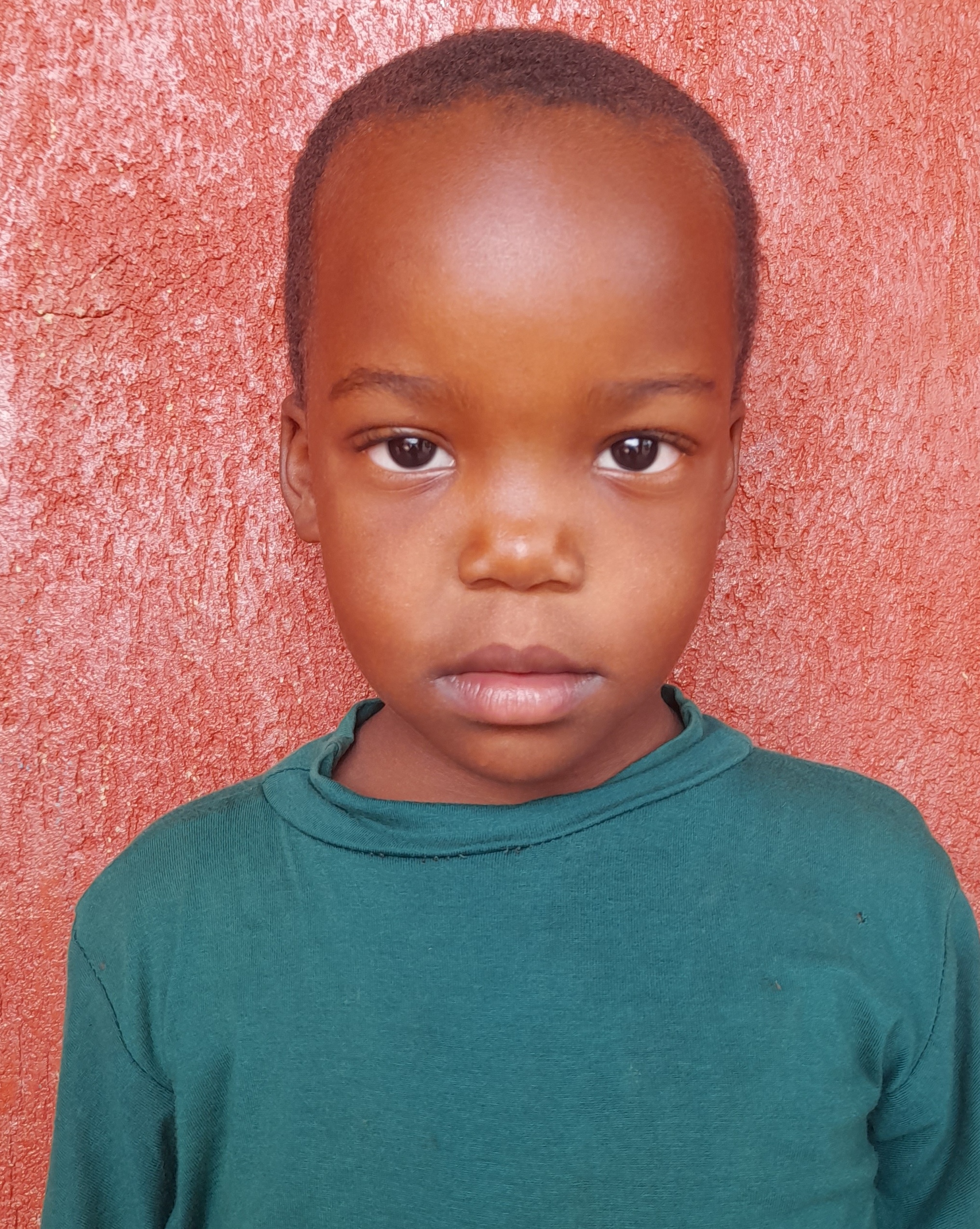 Bella Joana Uwikunda, 6 years old, she’s in primary one, likes playing games.jpg