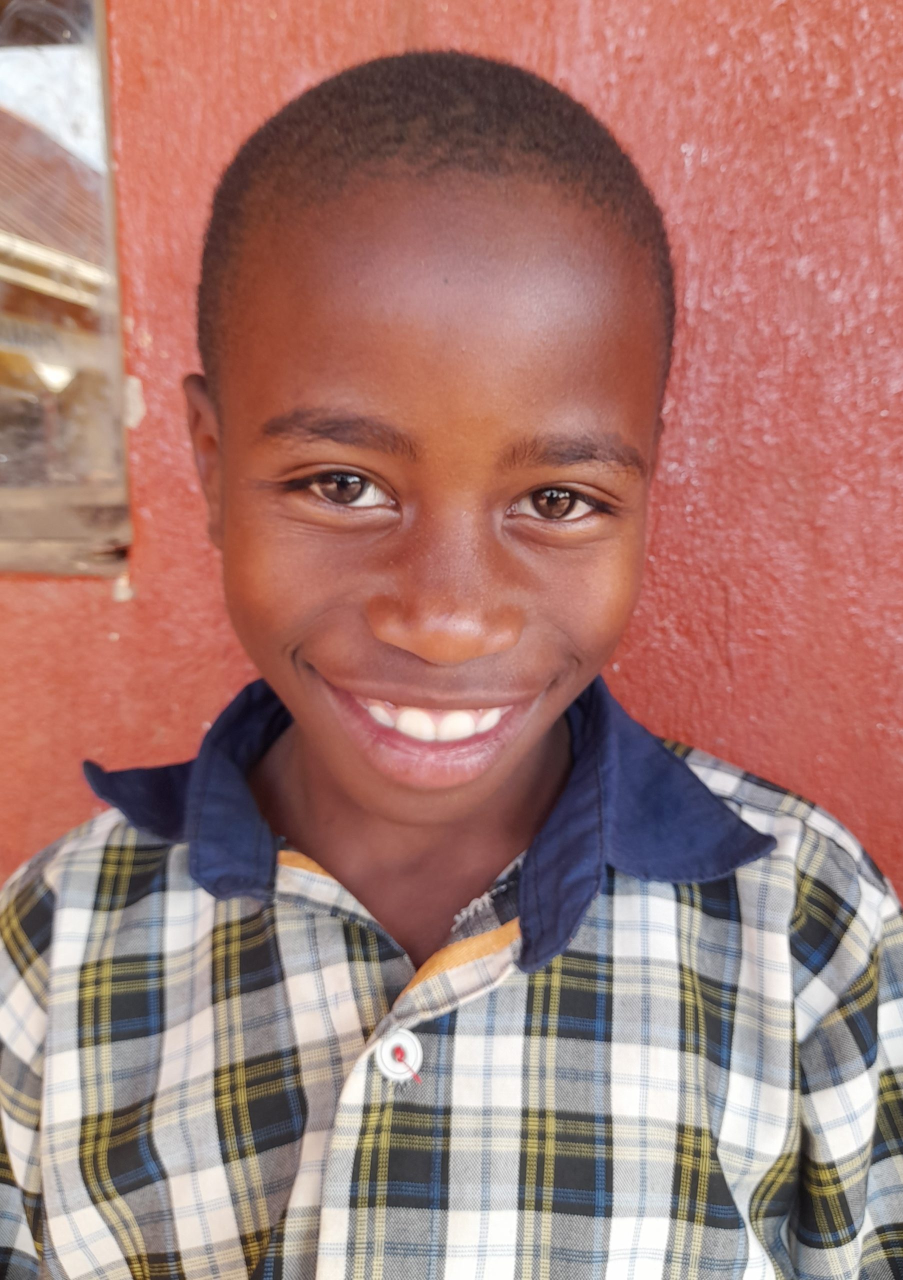 Graham Shon Mfarigi, 11 years old, he’s in primary five, like studing.jpg
