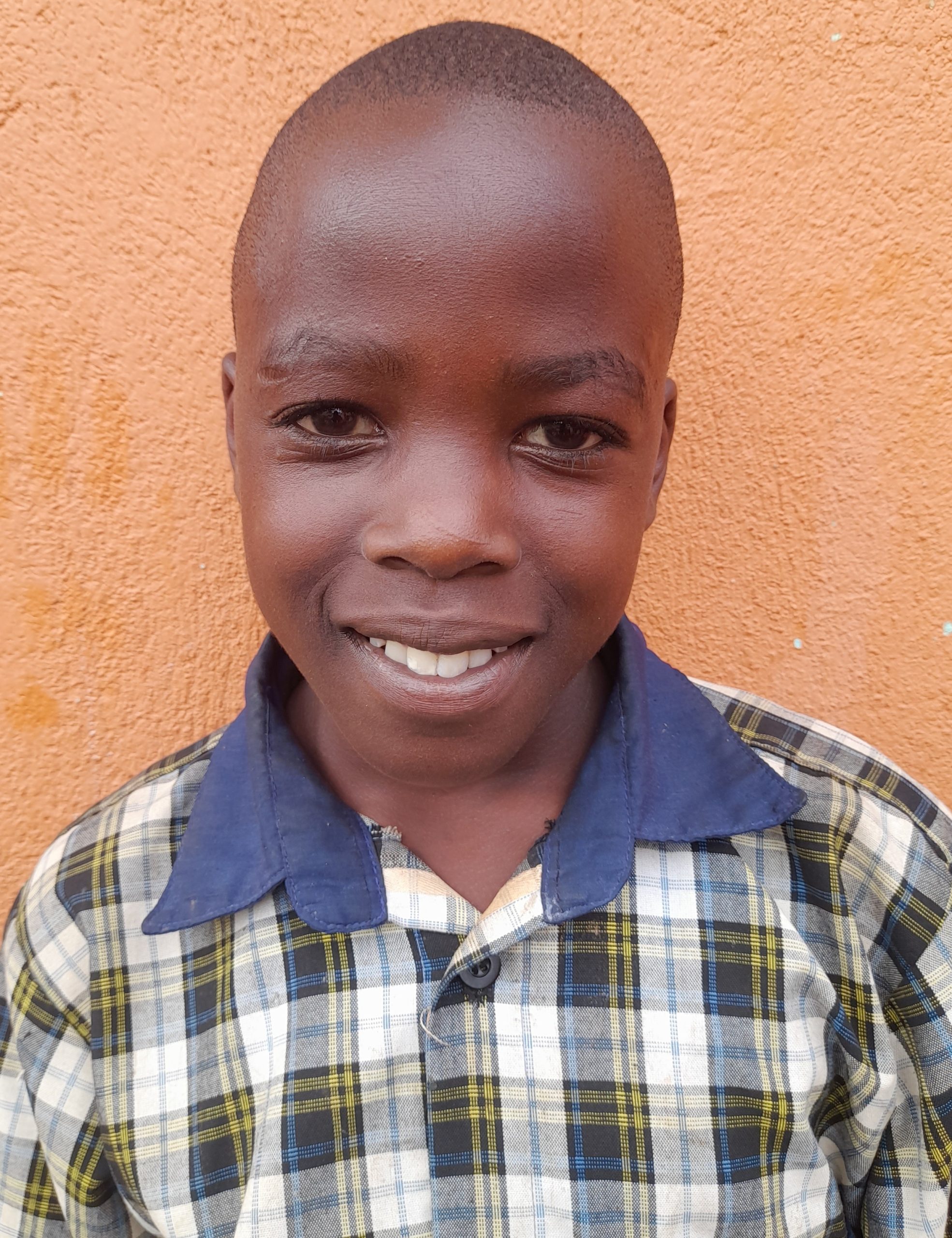 Mavin Sserunjoji 12years old, a Ugandan orphan, he’s in Primary three.jpg