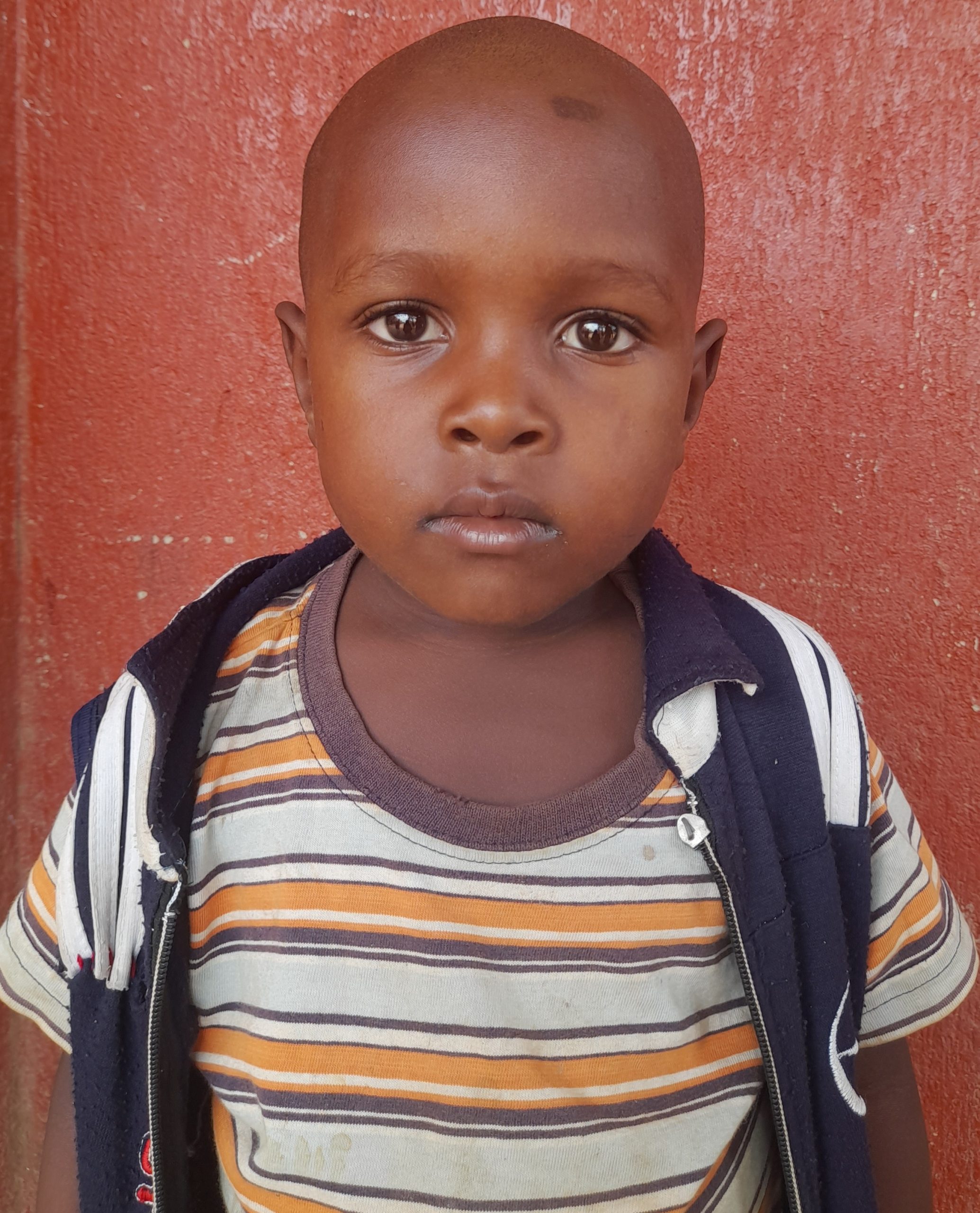 Mukisa Mbyemeye, 6 years old, he’s in primary one, likes playing netball..jpg