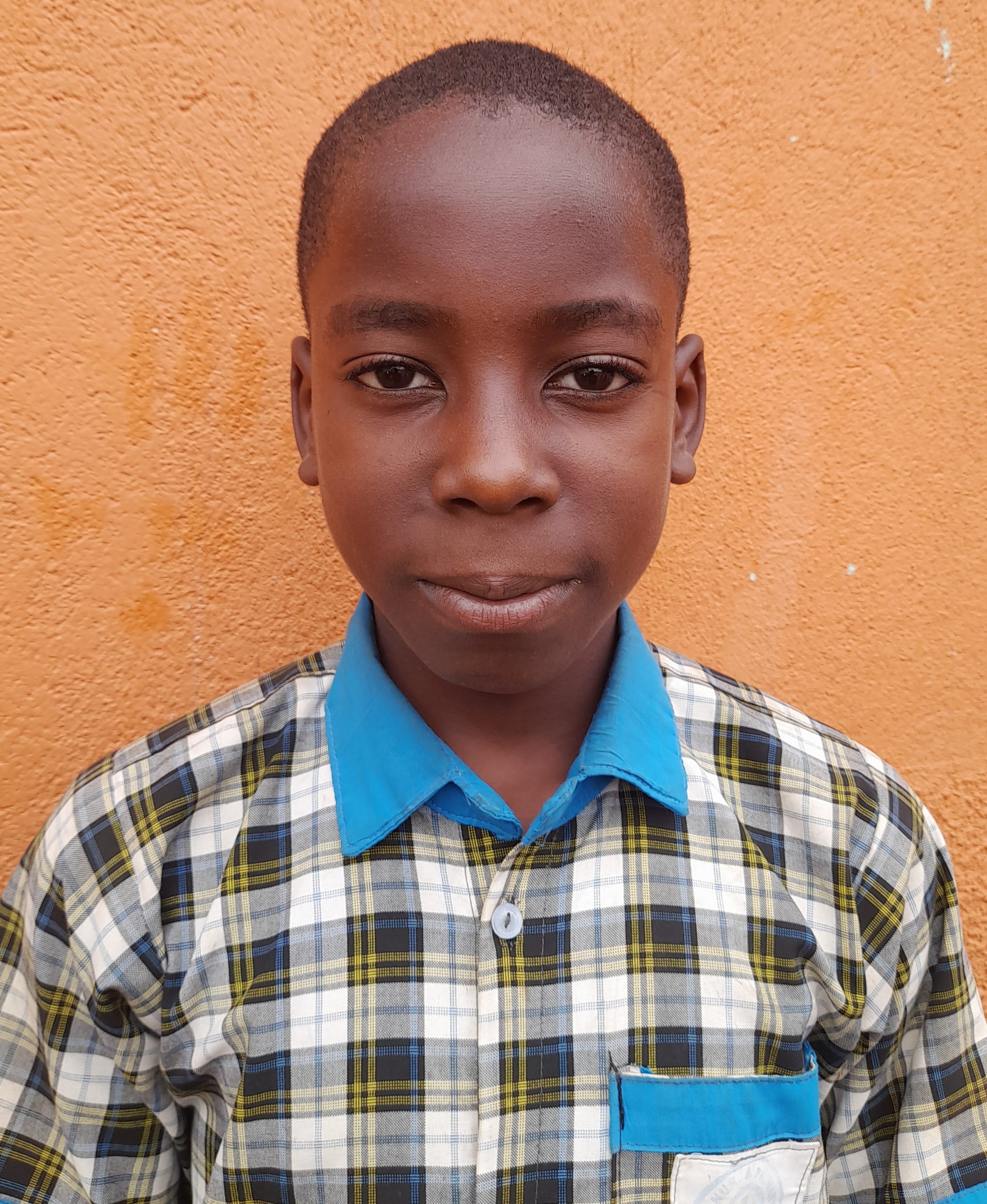 Precious Mwesigwa, 12 years old, he’s in primary seven, likes playing musical instruments..jpg