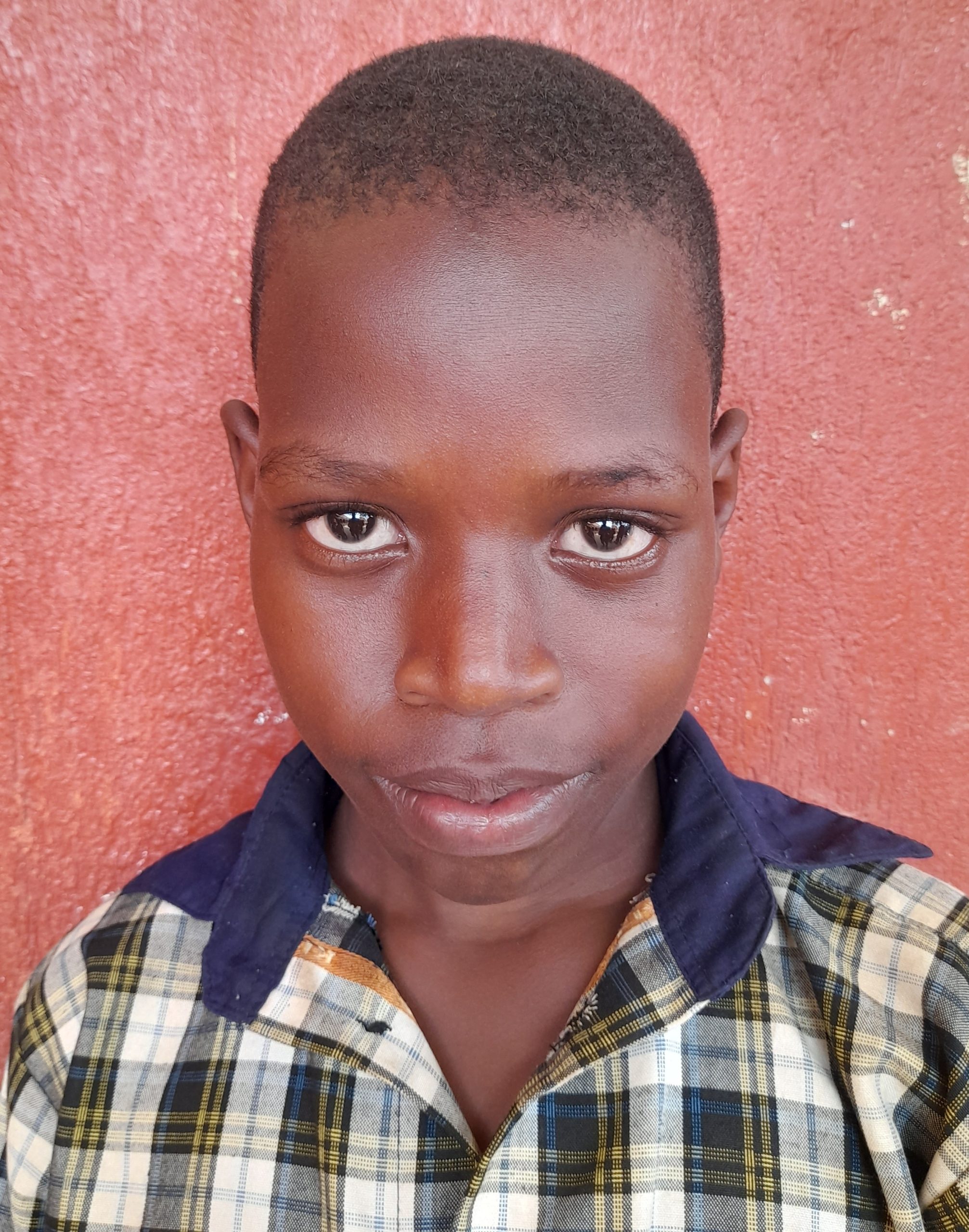 Ronald Ssegawa 11 years old, he’s in primary five, likes playing football..jpg