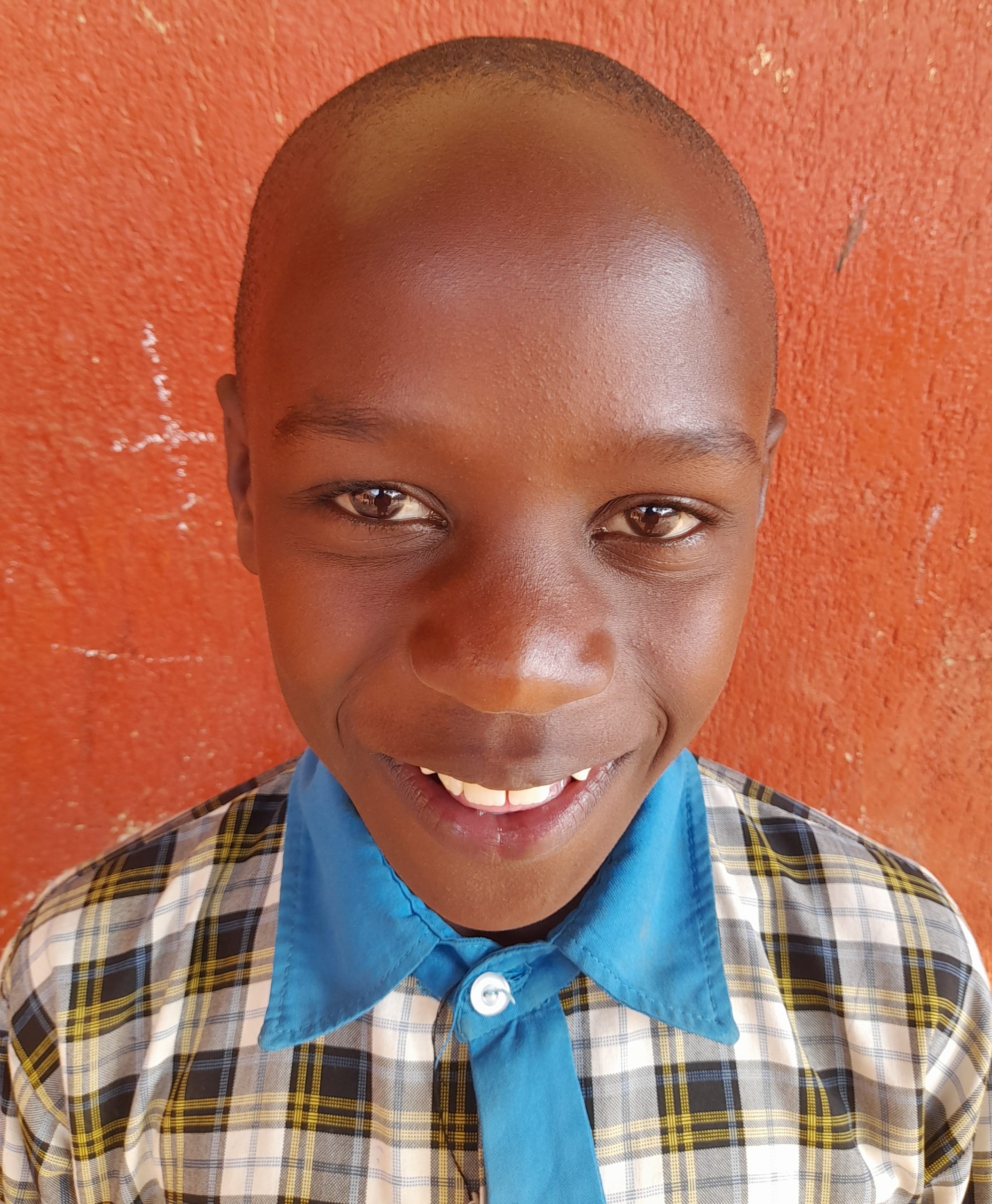Shabilu Muwonge, 12 years old, a Ugandan orphan he’s in primary 5 class.jpg