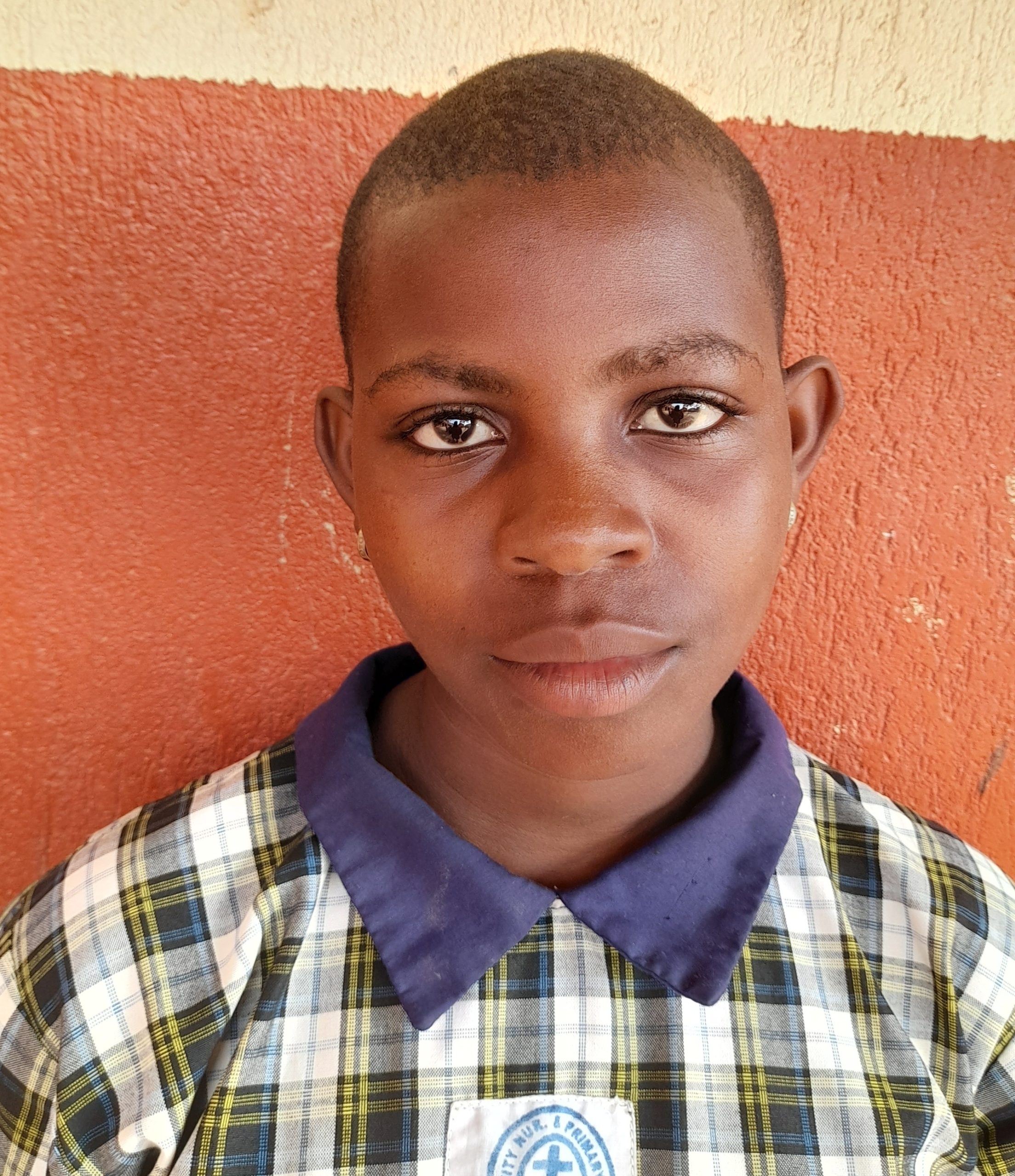 Sharon Namukisa, 14 yrs old Ugandan. she’s in primary seven. likes reading books..jpg