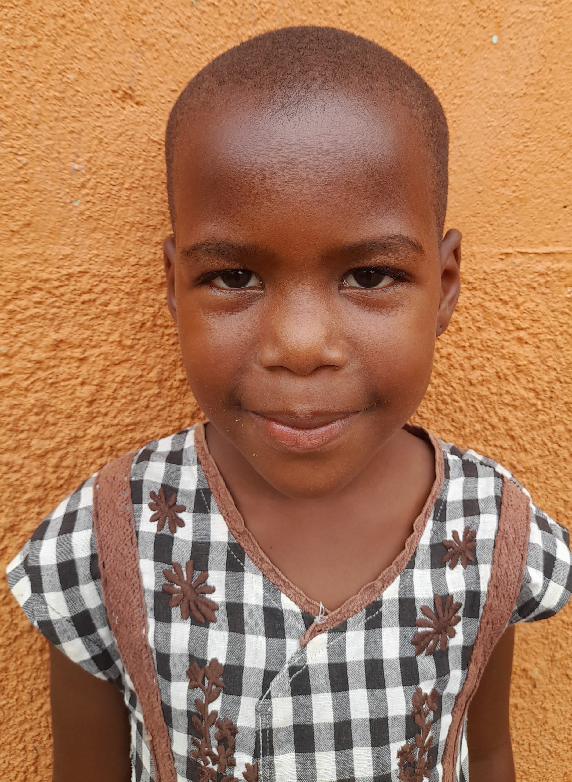 Trinity Mirembe 6 years old, she’s in primary two, likes playing netball and singing..jpg