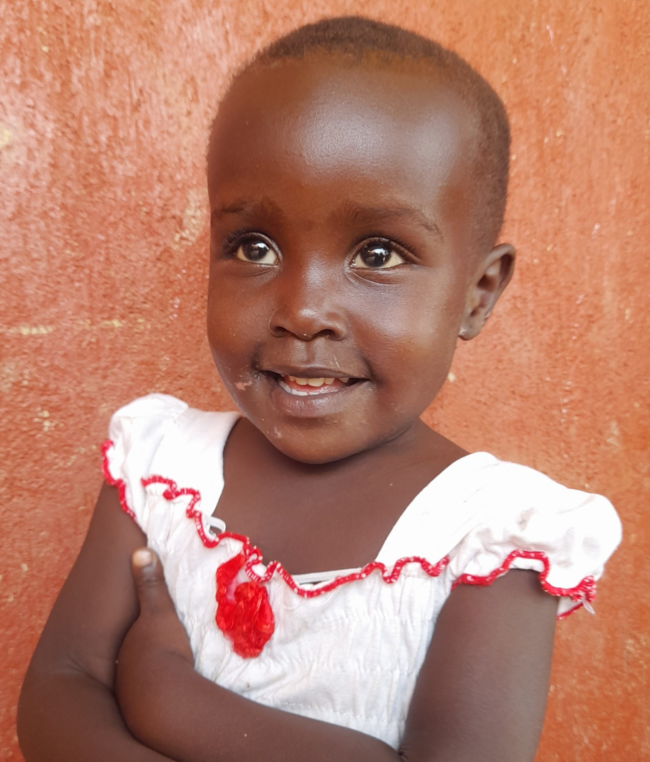 Trust Mulungi, 3 years old, she’s in baby class. likes singing.jpg