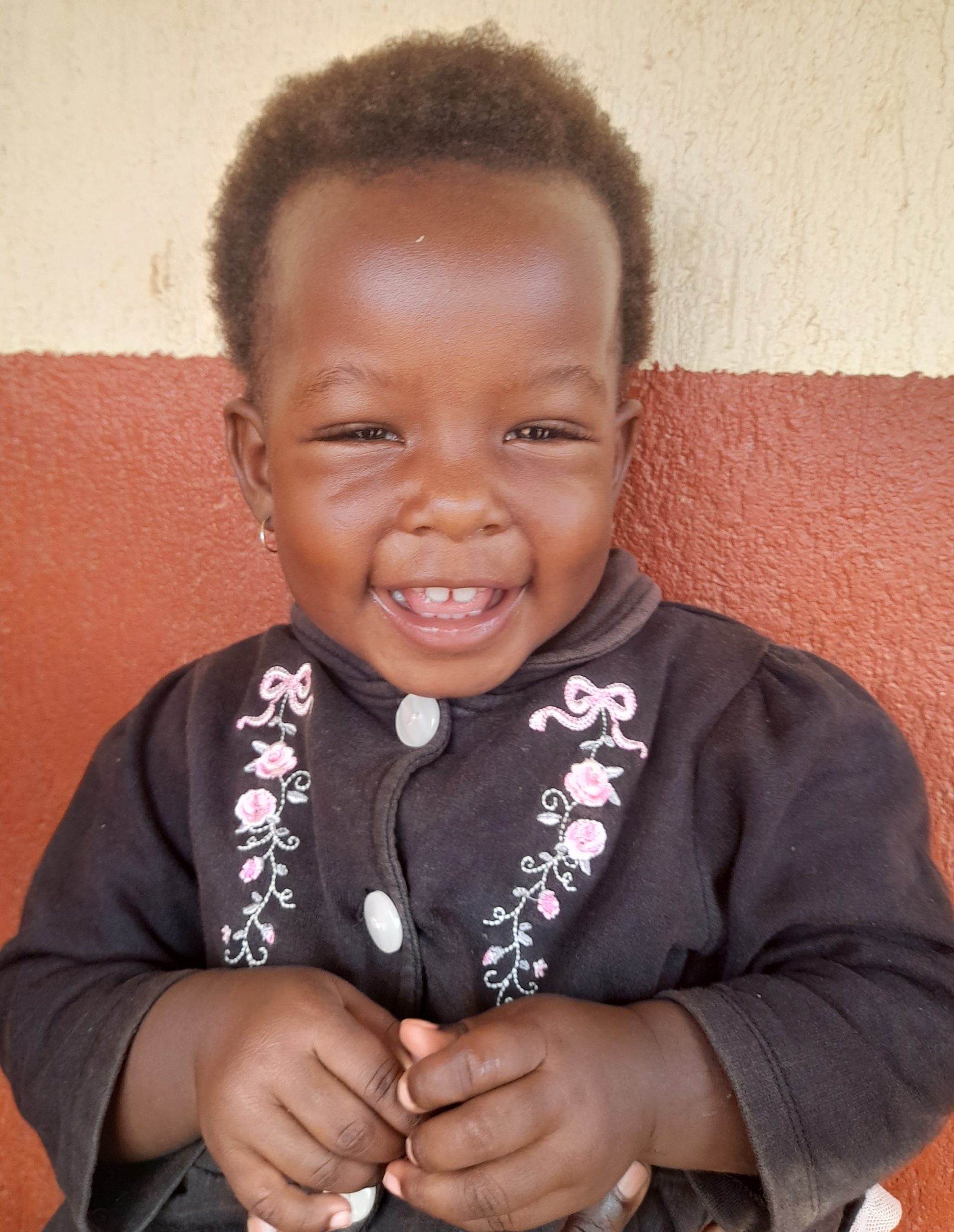Truth Mirembe, 3 years old, she’s in baby class, likes playing with toys and singing..jpg