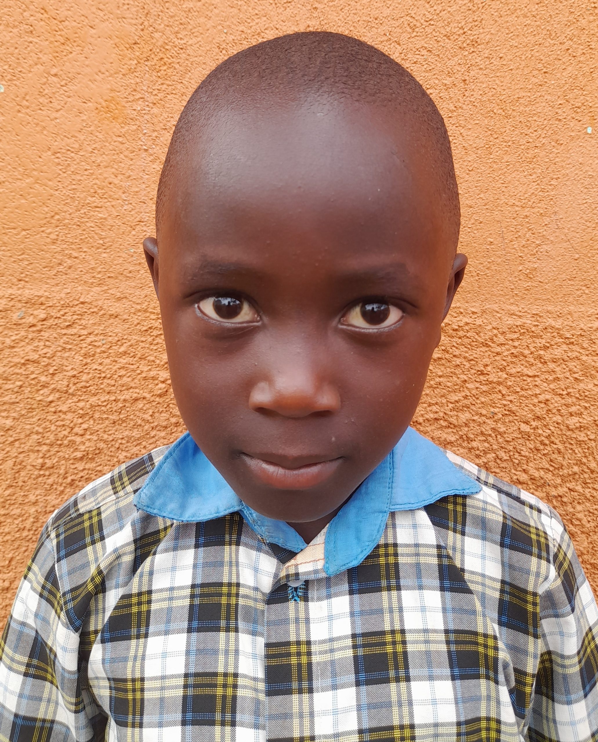 Vicent Ssemakula, 7 years old, he’s in primary two, likes playing football..jpg