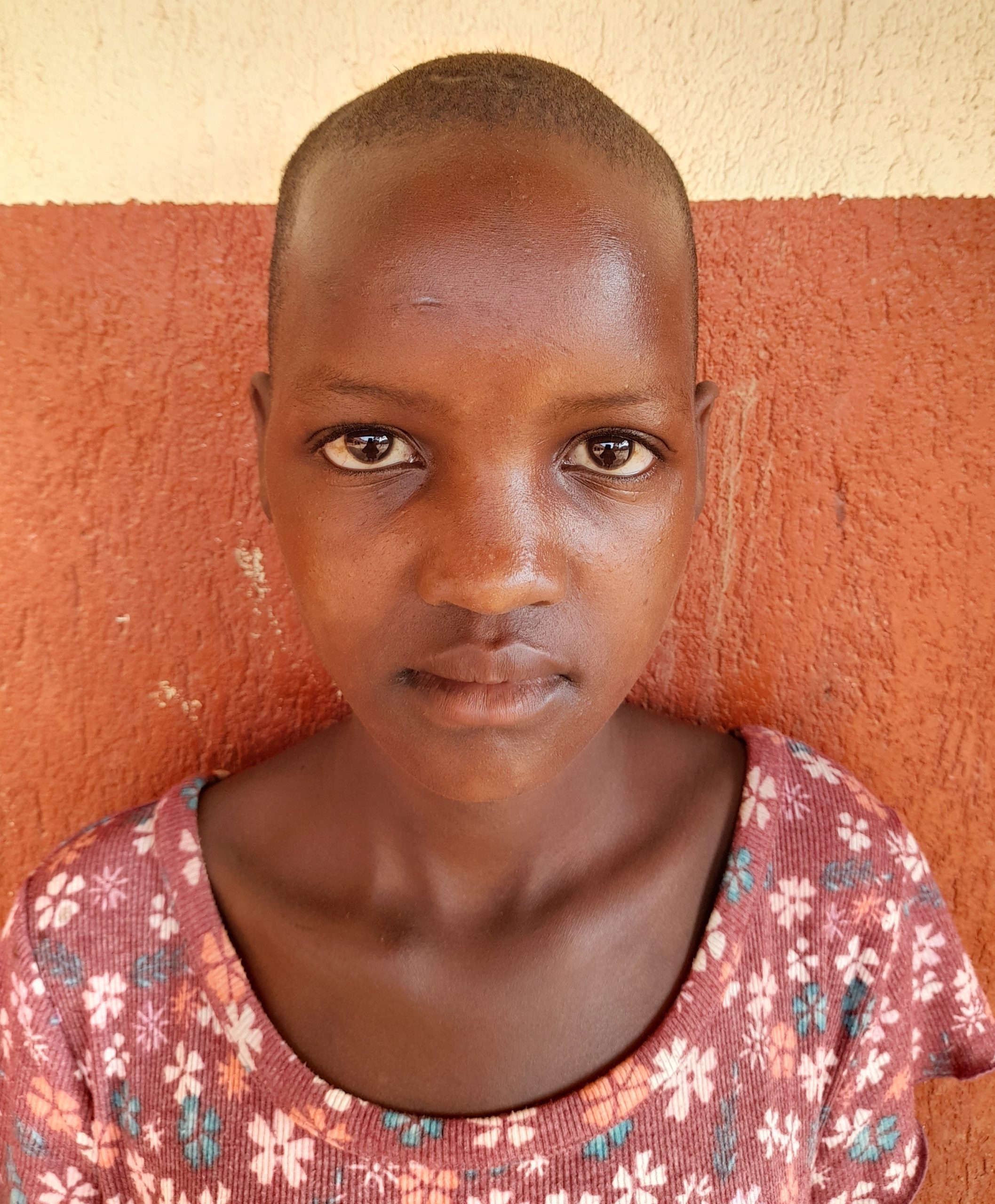 Zahara Nansamba, 13 years old, she’s in primary six, staying with her grandmother after being abandoned by her father..jpg